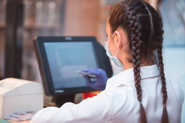 A scientist working in a high-tech lab, focusing on a gene editing experiment with advanced equipment and computer screens displaying DNA sequences.