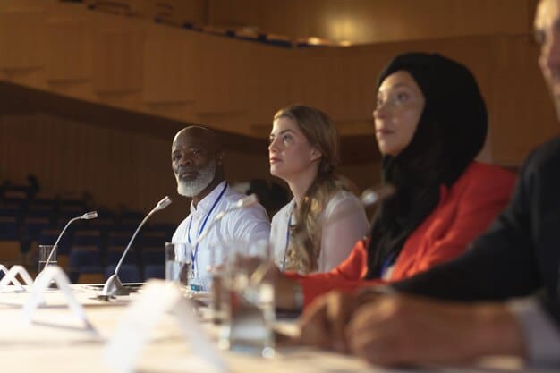 A diverse group of people participating in a panel discussion at a biotech conference, representing various stakeholders in the gene editing debate.