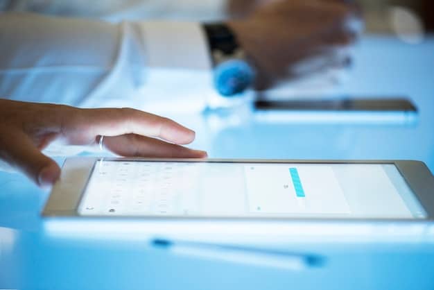 A close-up shot of a person meticulously reviewing the attendee list of a US Biotech Event on a tablet, highlighting key individuals and companies.
