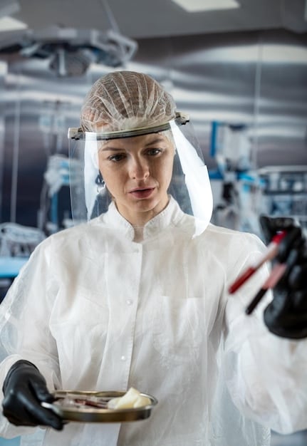 A scientist in a sterile cleanroom environment, wearing protective gear and working with bioreactors for cell culture and biopharmaceutical production, highlighting the precision and controlled conditions required in biomanufacturing.