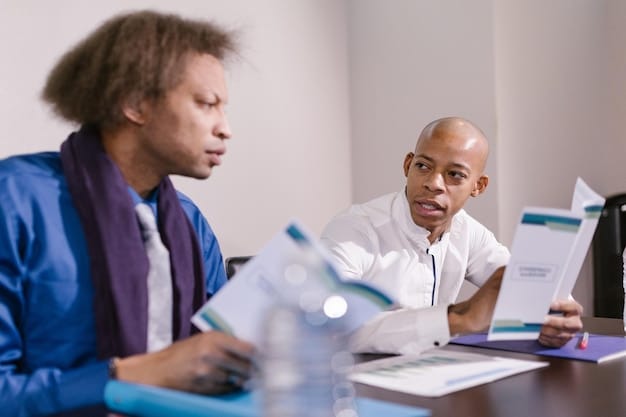 A diverse group of investors and biotech executives in a conference room, reviewing documents and discussing financial strategies. The atmosphere is professional and collaborative, highlighting the importance of teamwork in investment decisions.